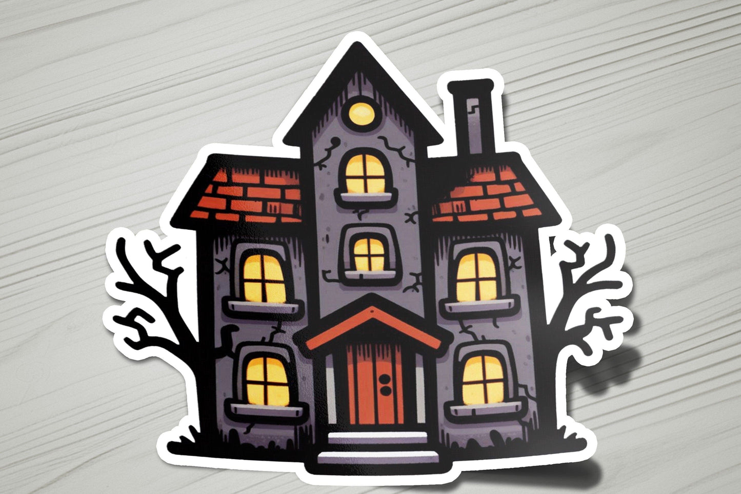 a sticker of a house with a red door