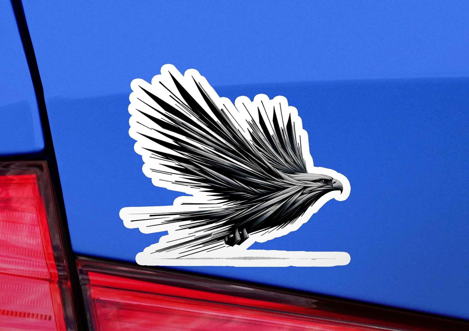 a car with a sticker of a bird on it