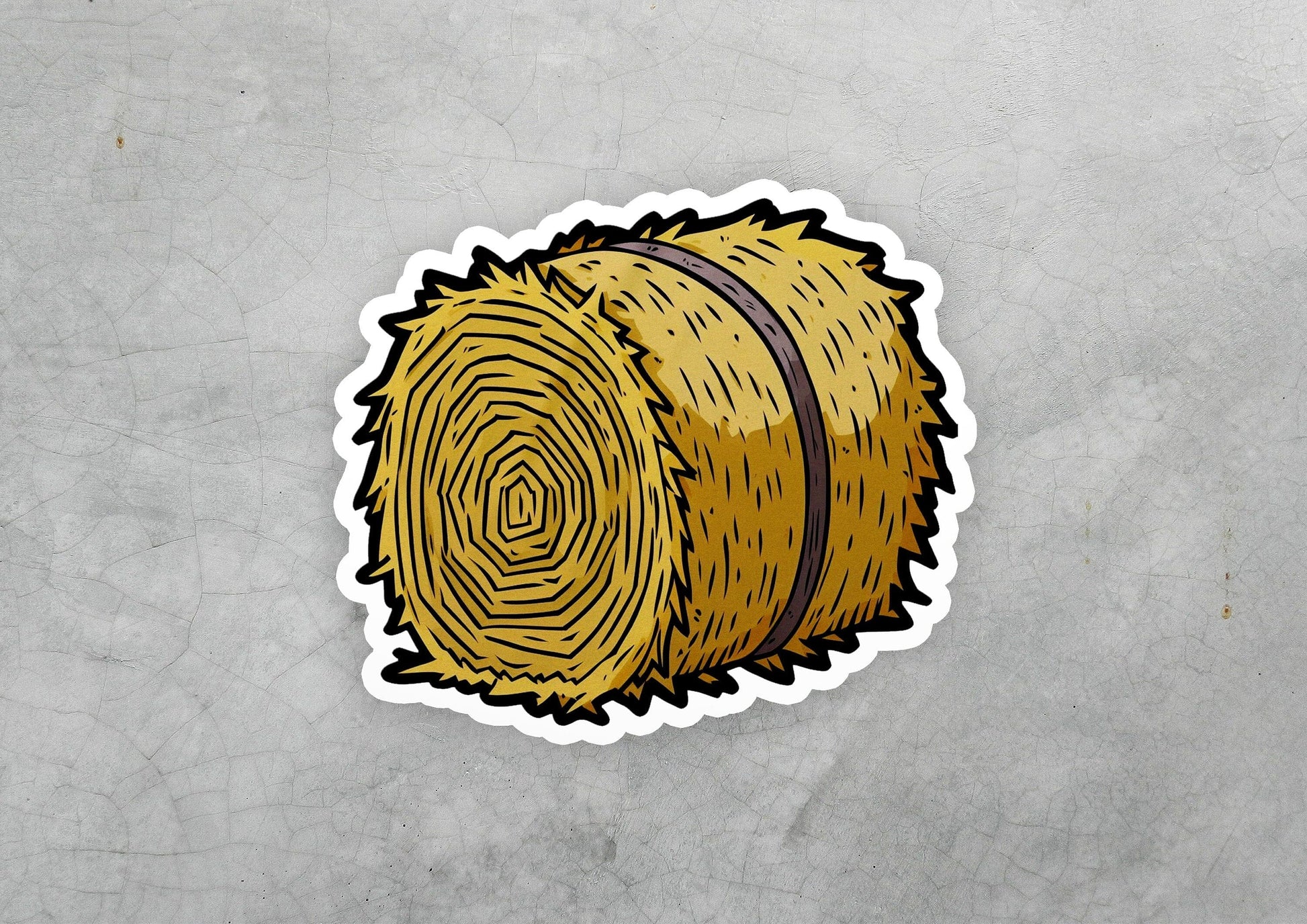 a sticker of a round hay bale
