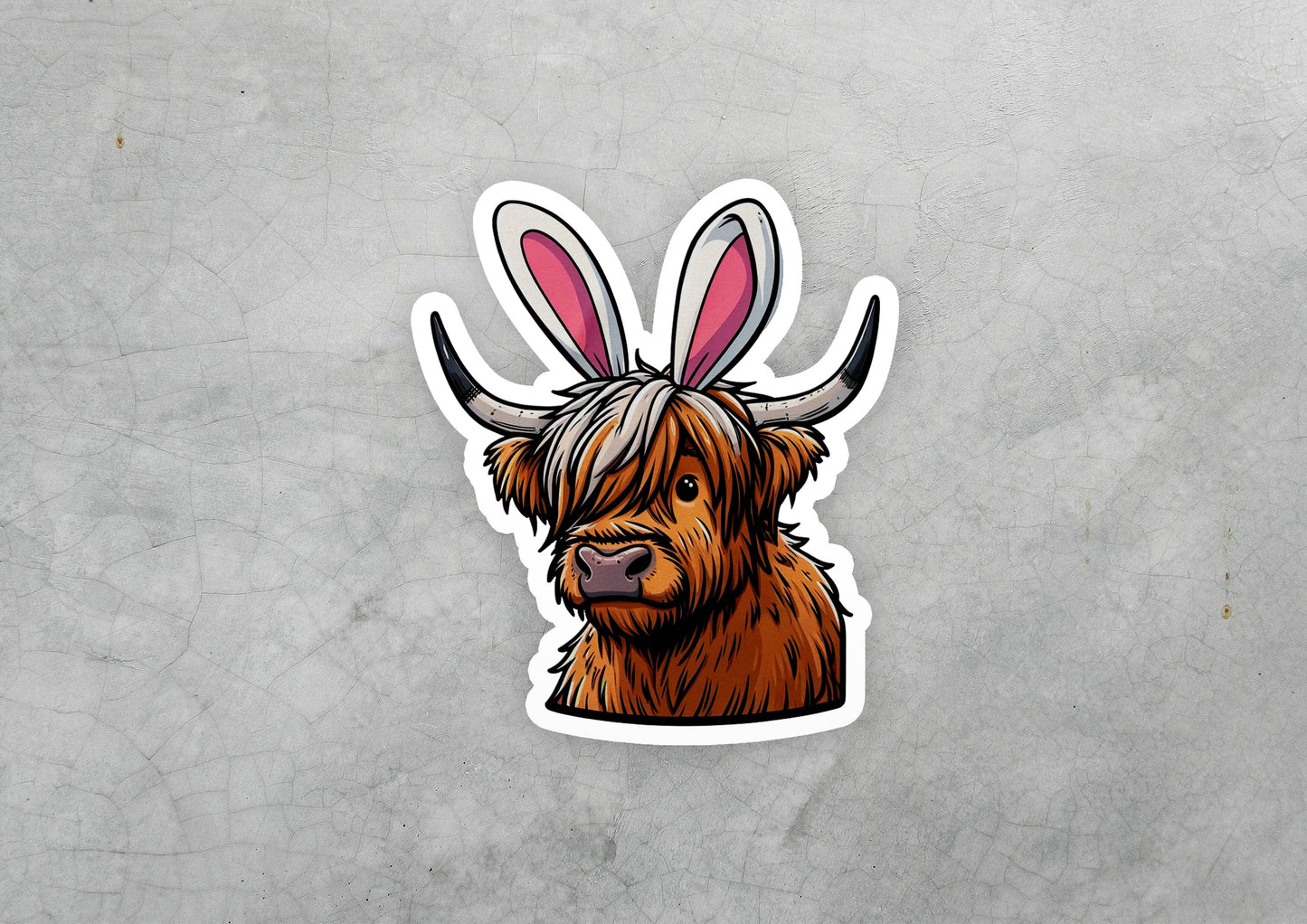 a sticker of a brown cow with long horns