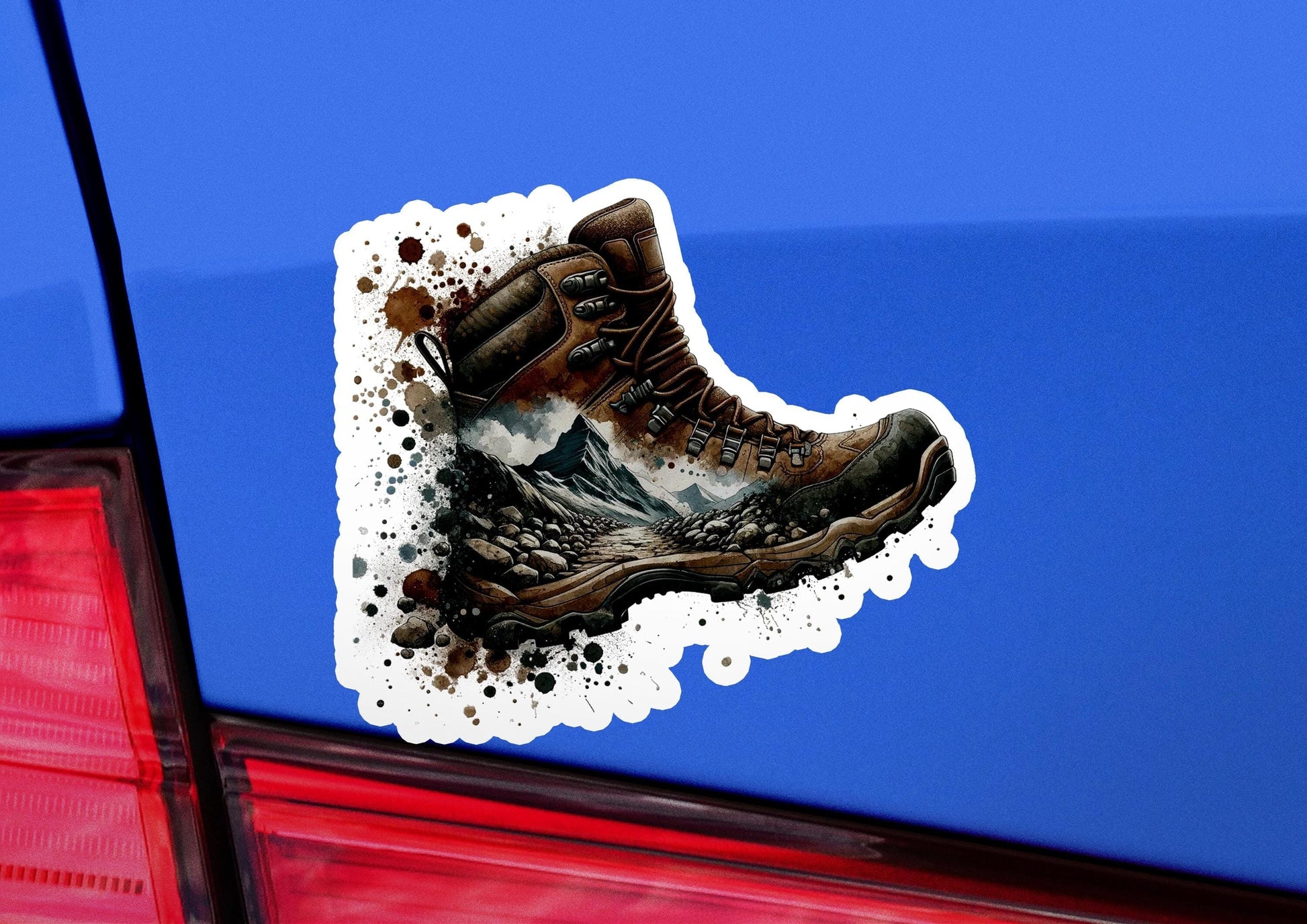 a sticker of a pair of hiking boots on the back of a car