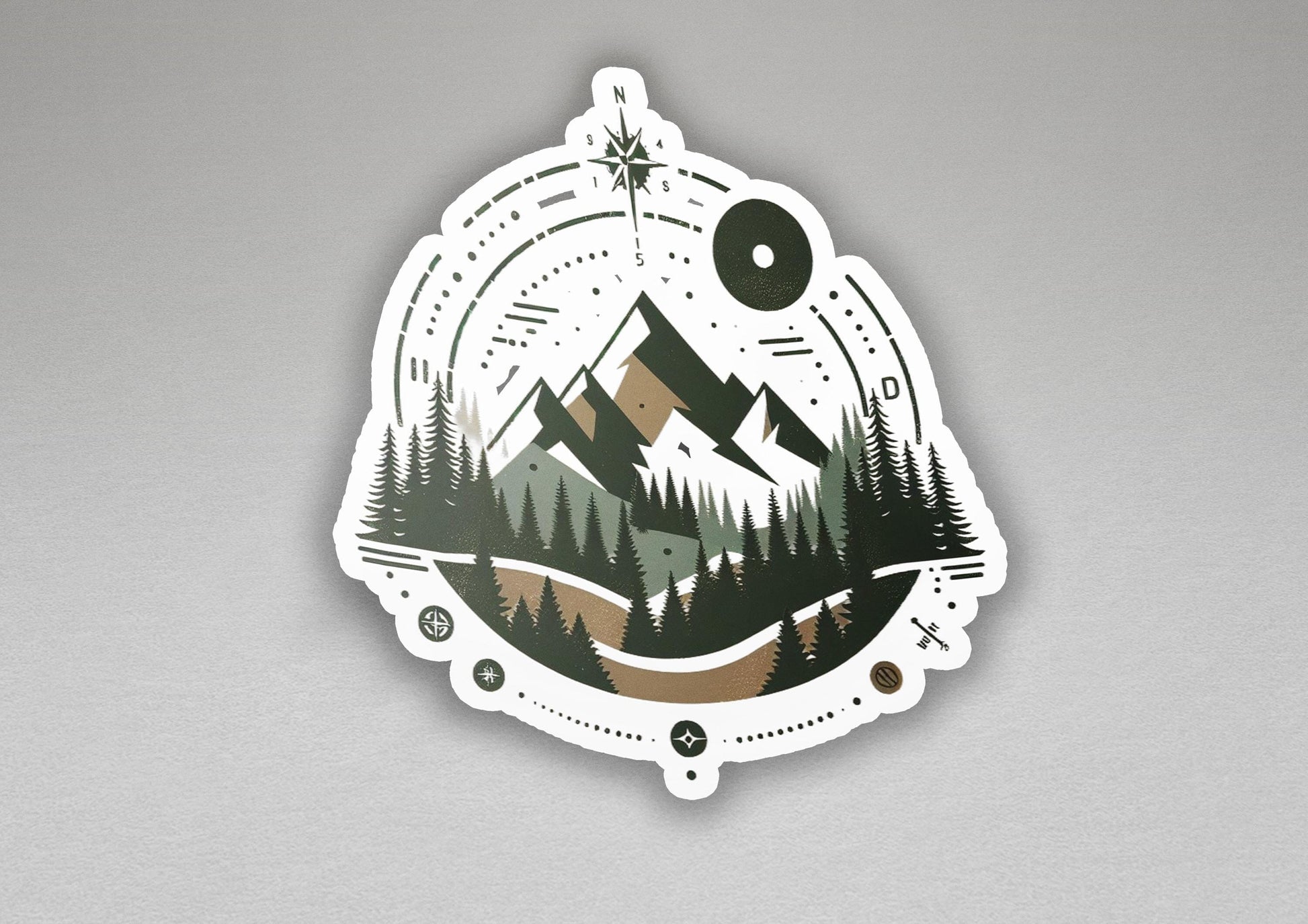 a sticker with a picture of a mountain and trees