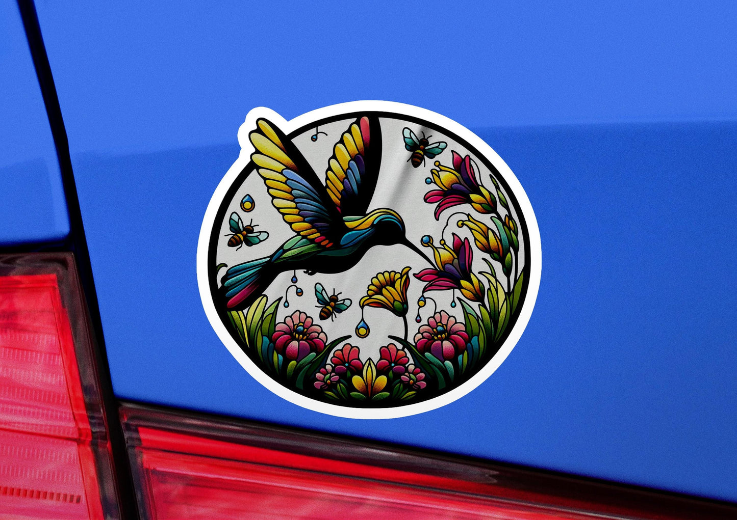 a sticker on the back of a blue car