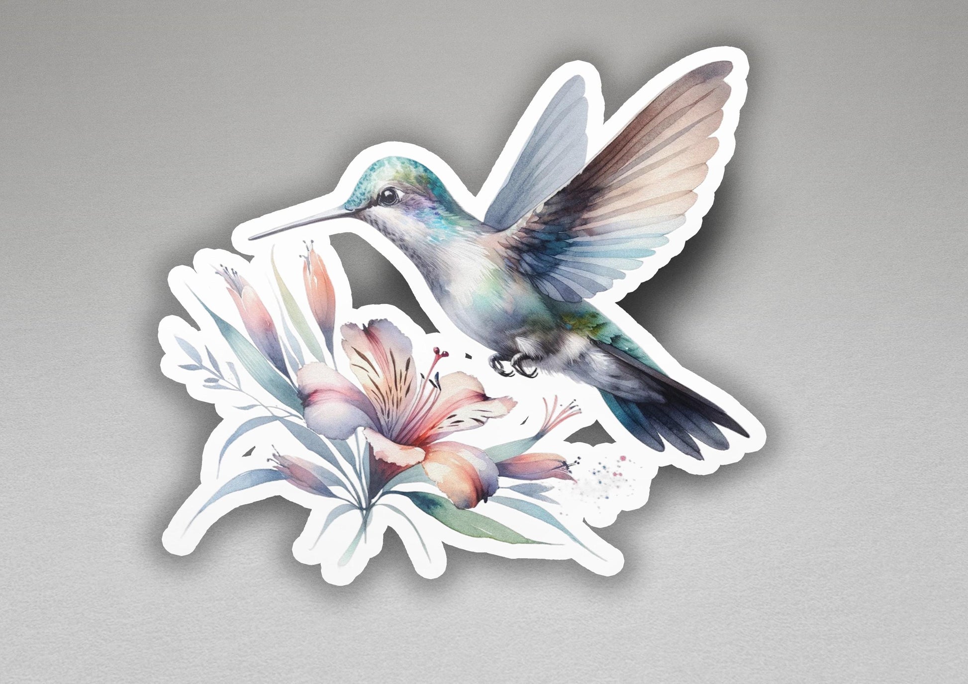 a sticker of a hummingbird flying over a flower