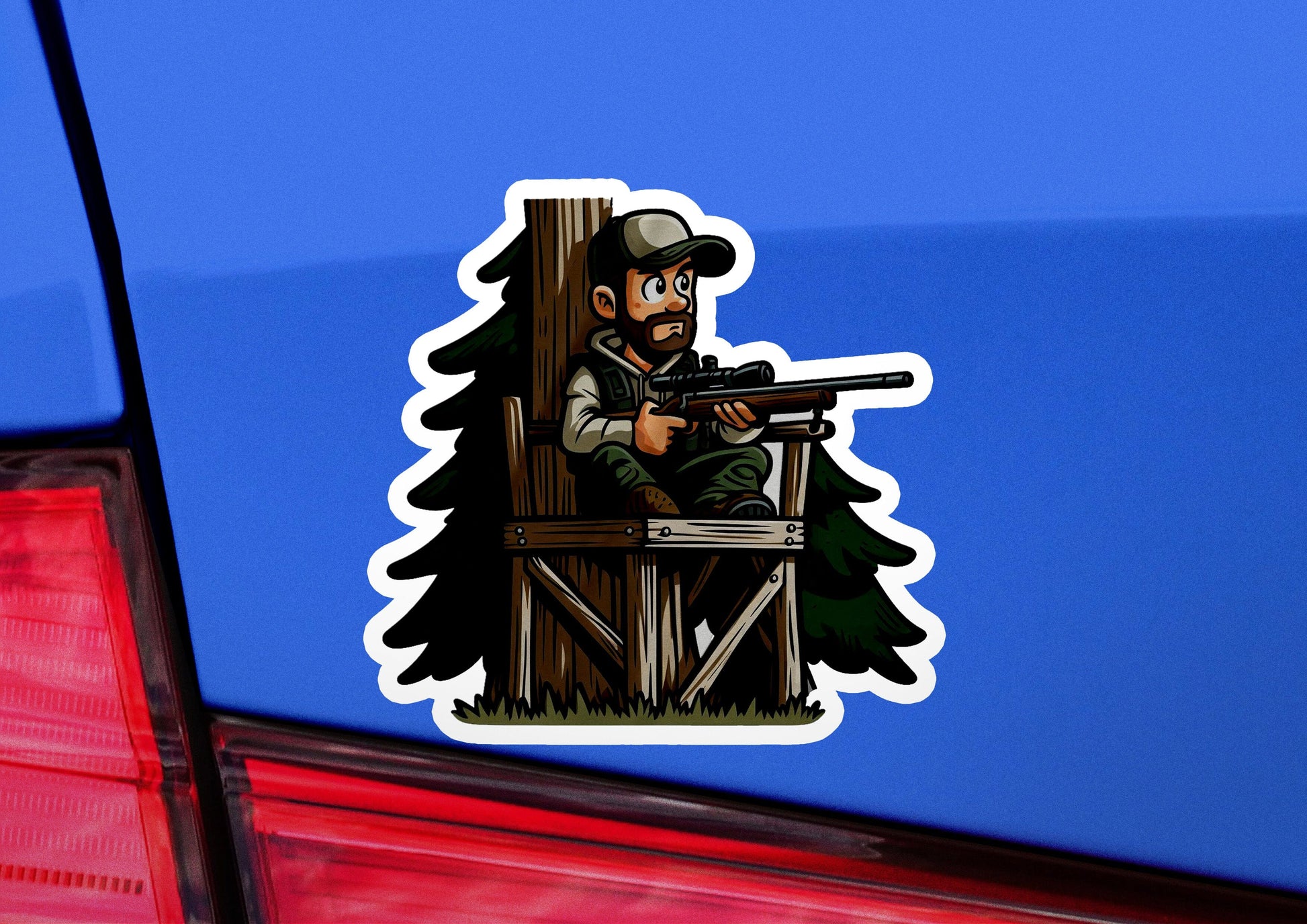 a sticker of a man with a gun on the back of a car