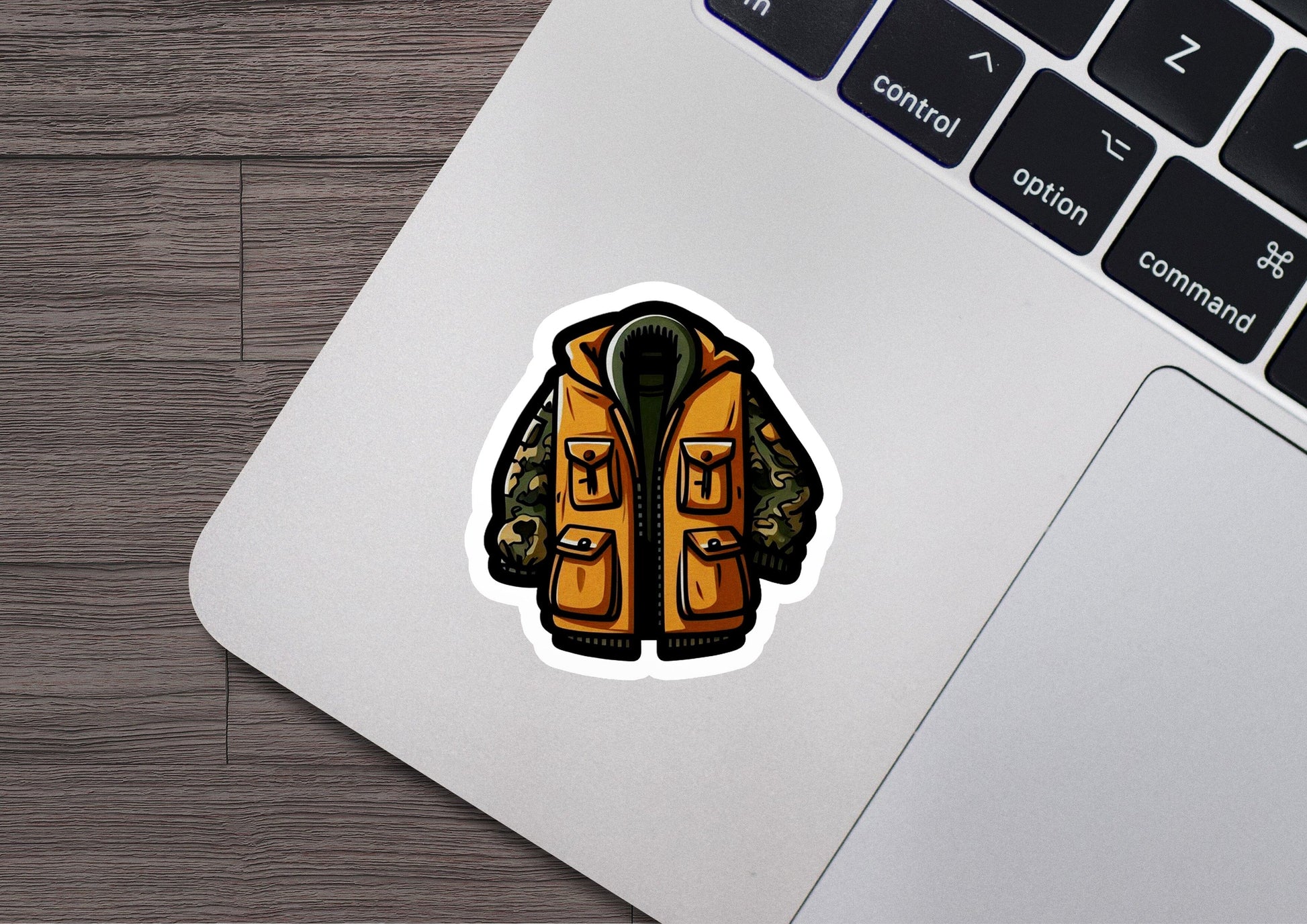 a laptop with a sticker of a jacket on it