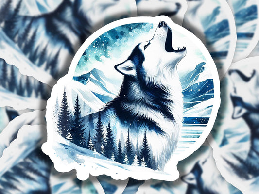 a wolf sticker sitting on top of a snow covered ground