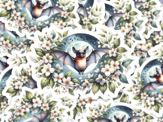 a picture of a bat surrounded by flowers and leaves