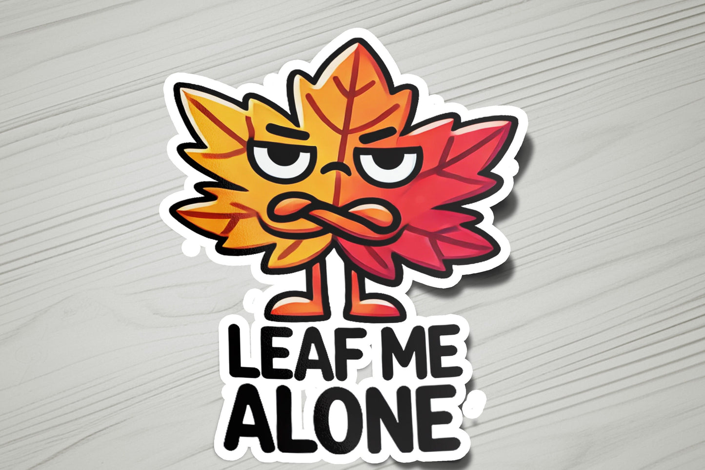 a sticker that says leaf me alone