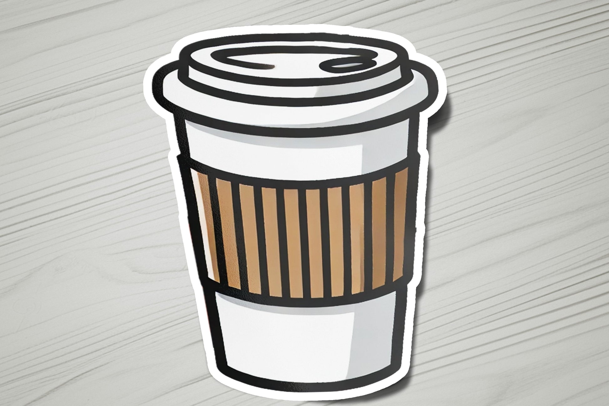 a sticker of a coffee cup on a table