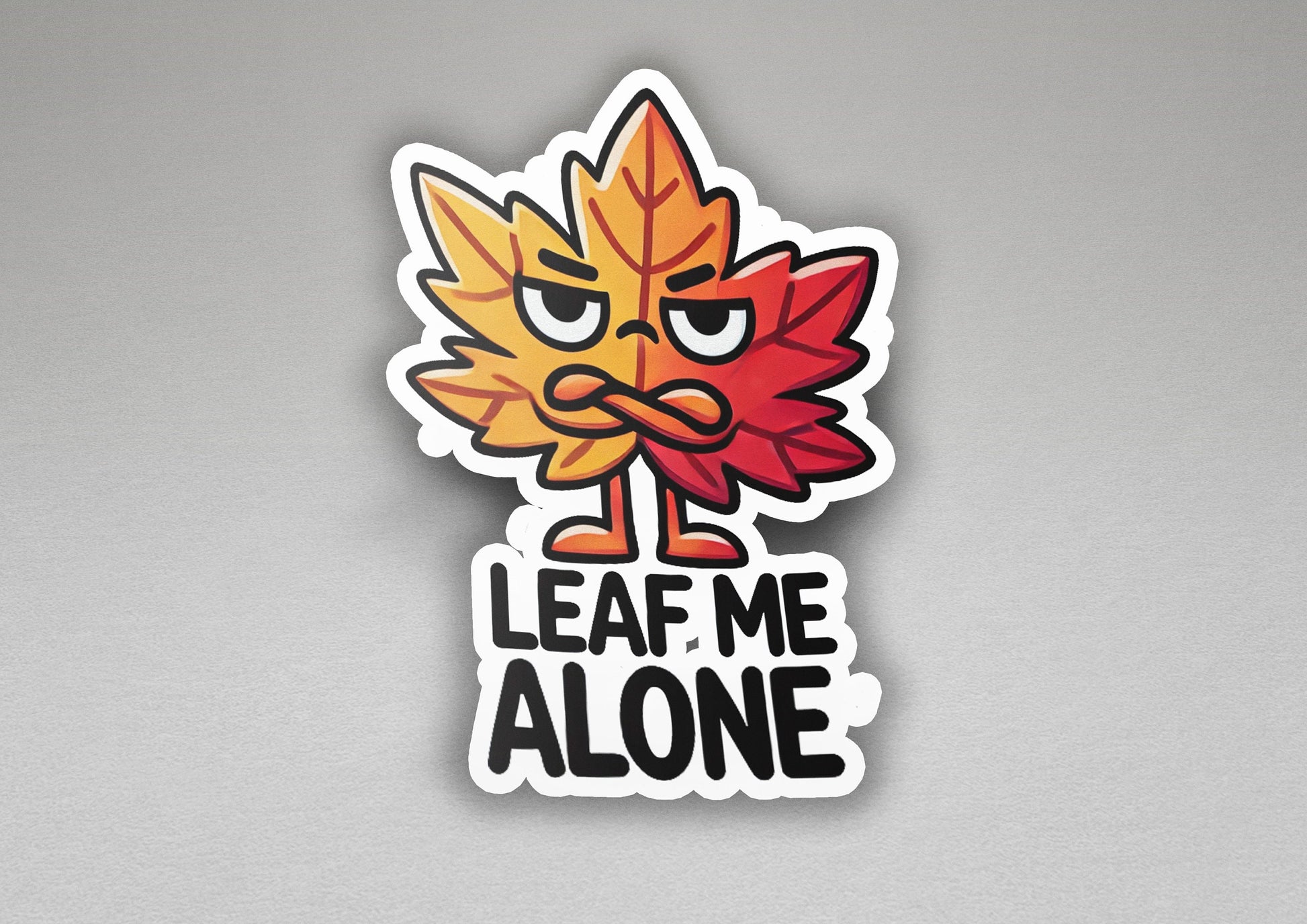 a sticker of a leaf me alone