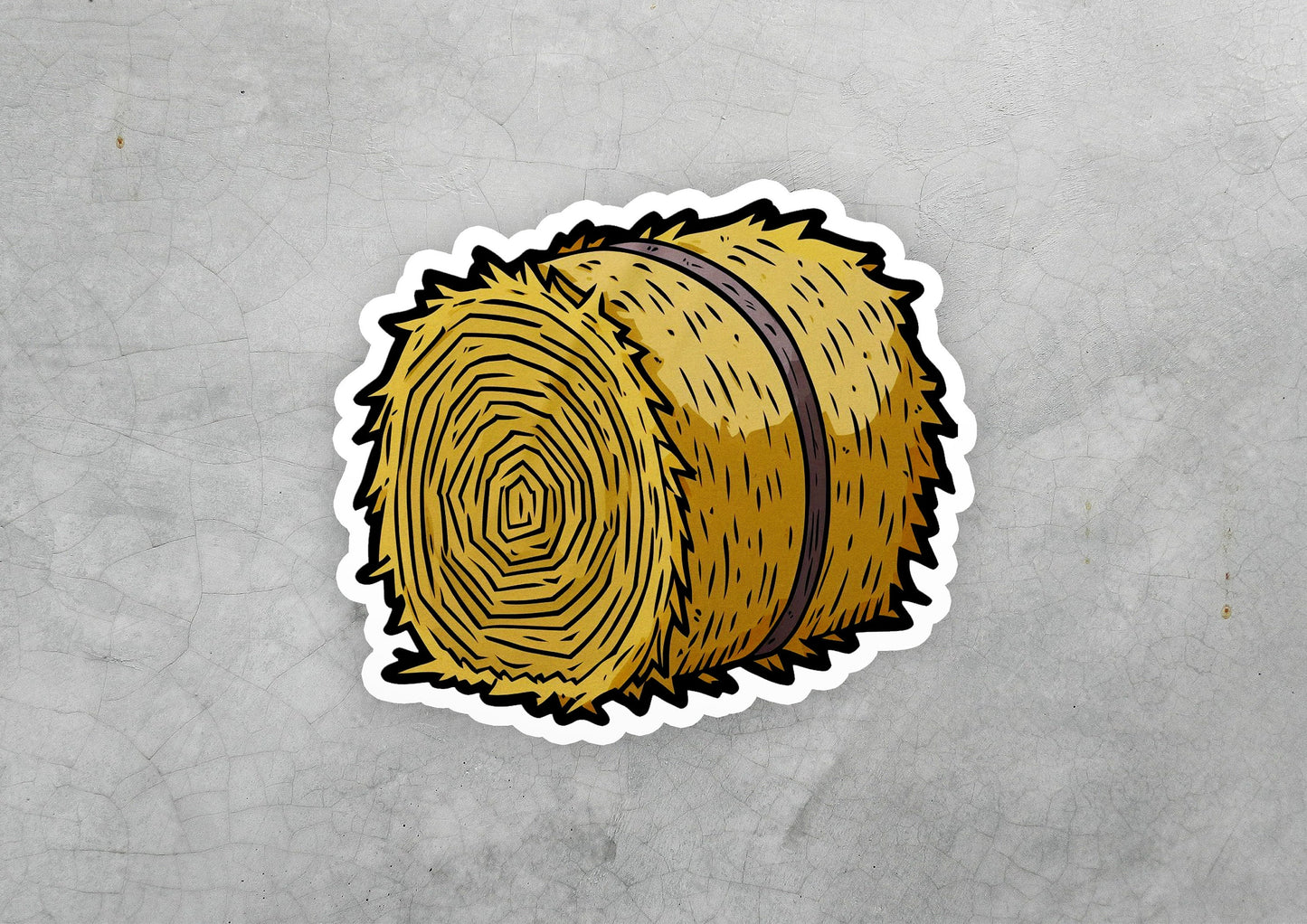 a sticker of a round hay bale