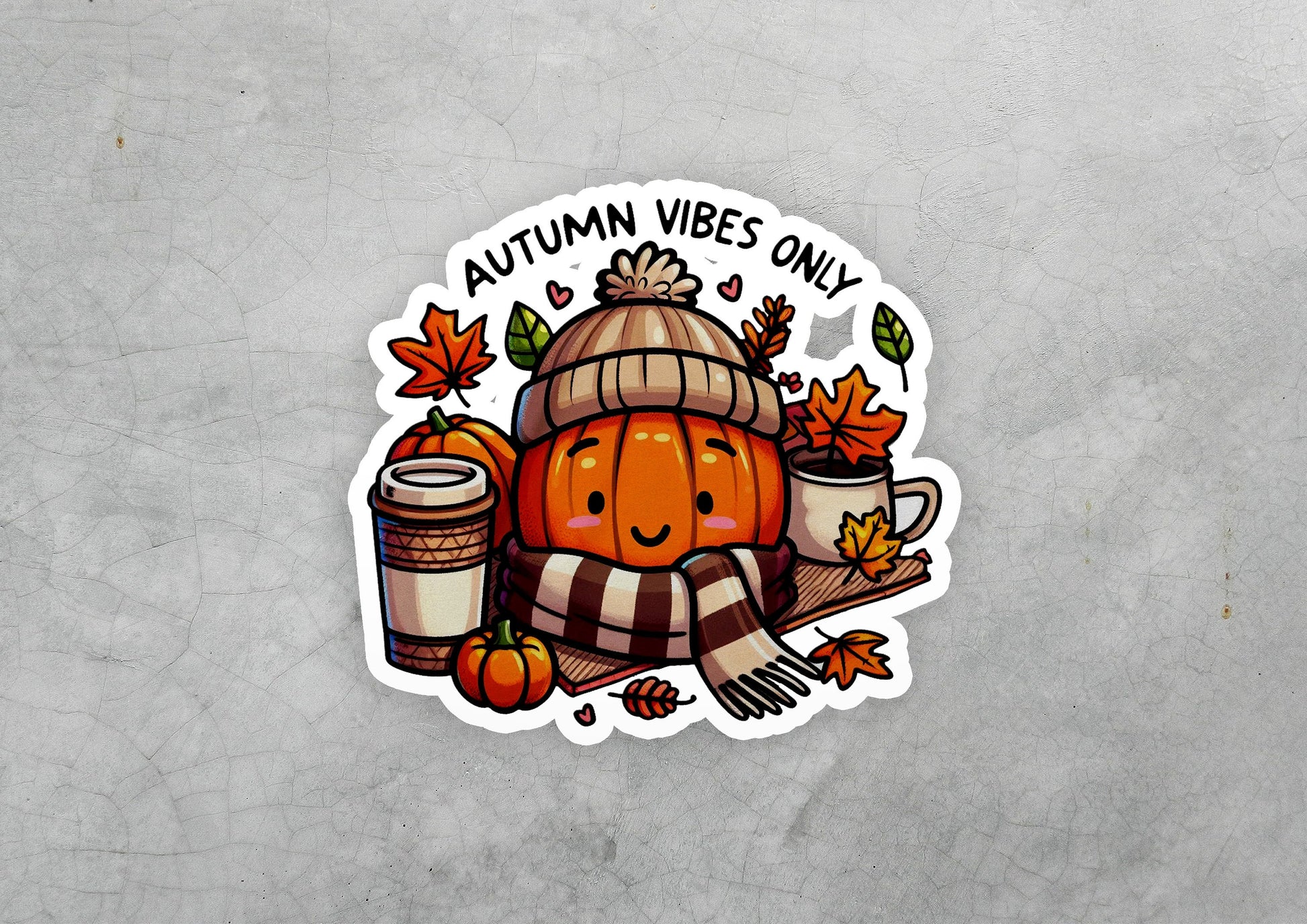 a sticker of a pumpkin with a hat, scarf and a mug of coffee