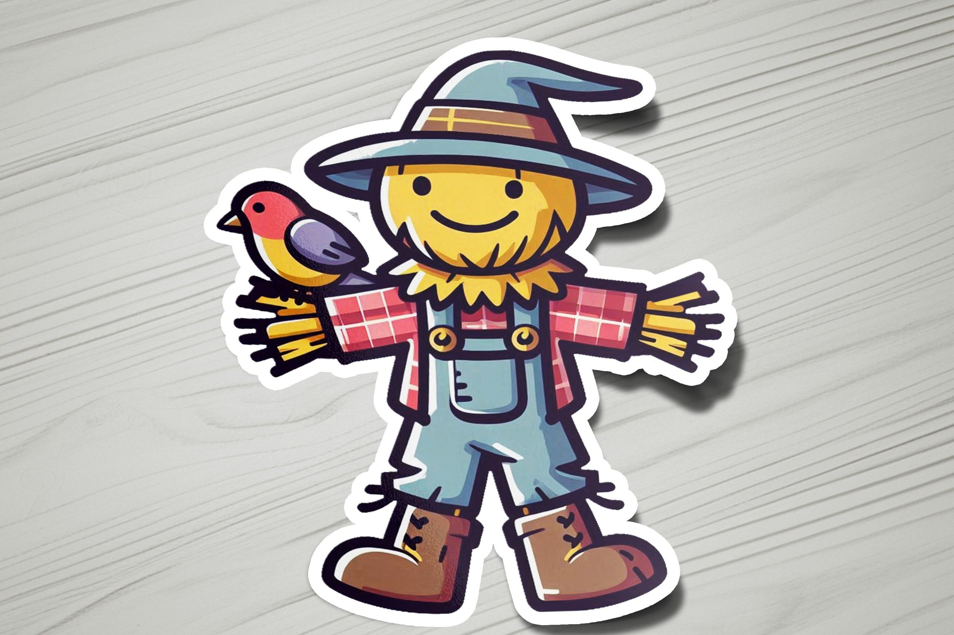 a sticker of a scarecrow holding a bird