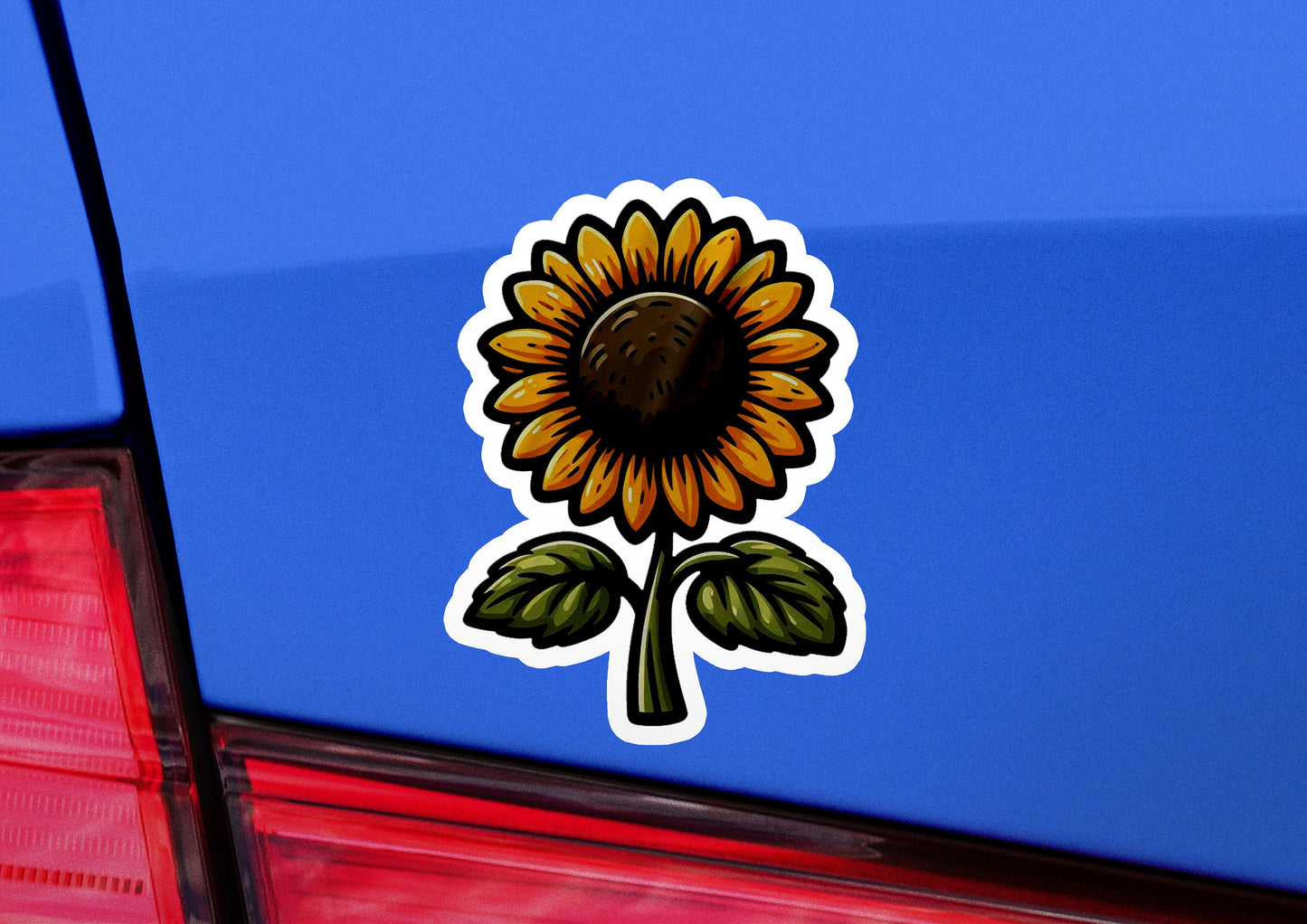 a sticker of a sunflower on the back of a car