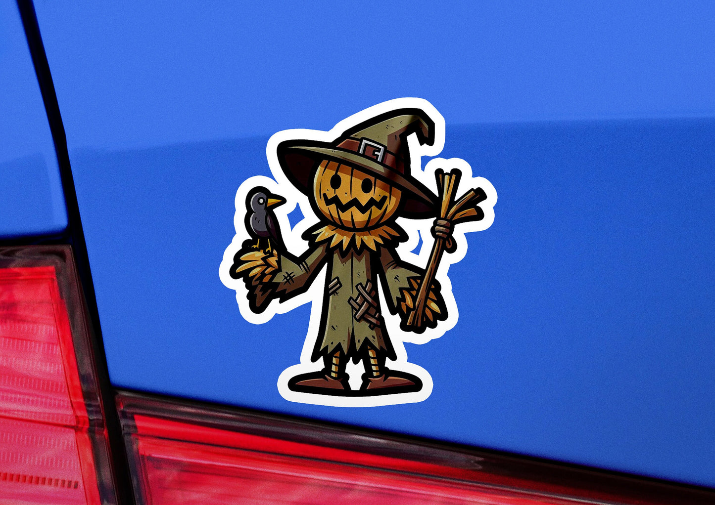 a car with a sticker of a scarecrow on it