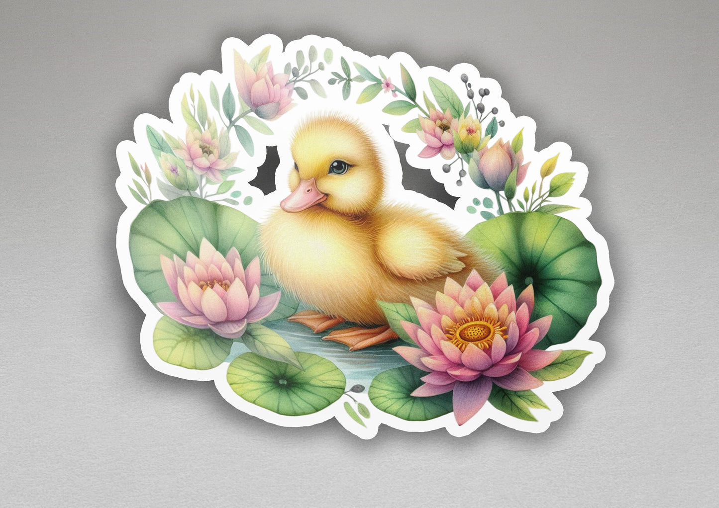 a sticker of a duckling sitting on a lily pad