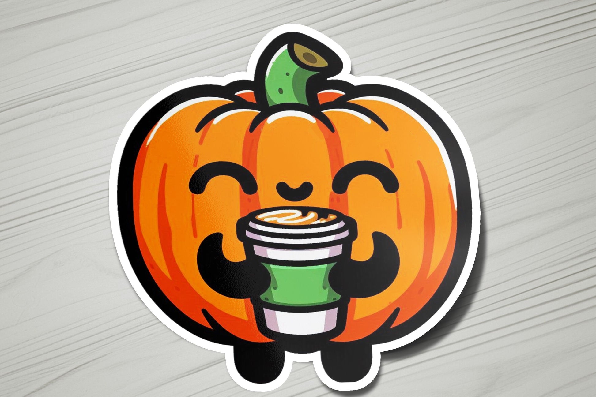 a sticker of a pumpkin with a cup of coffee