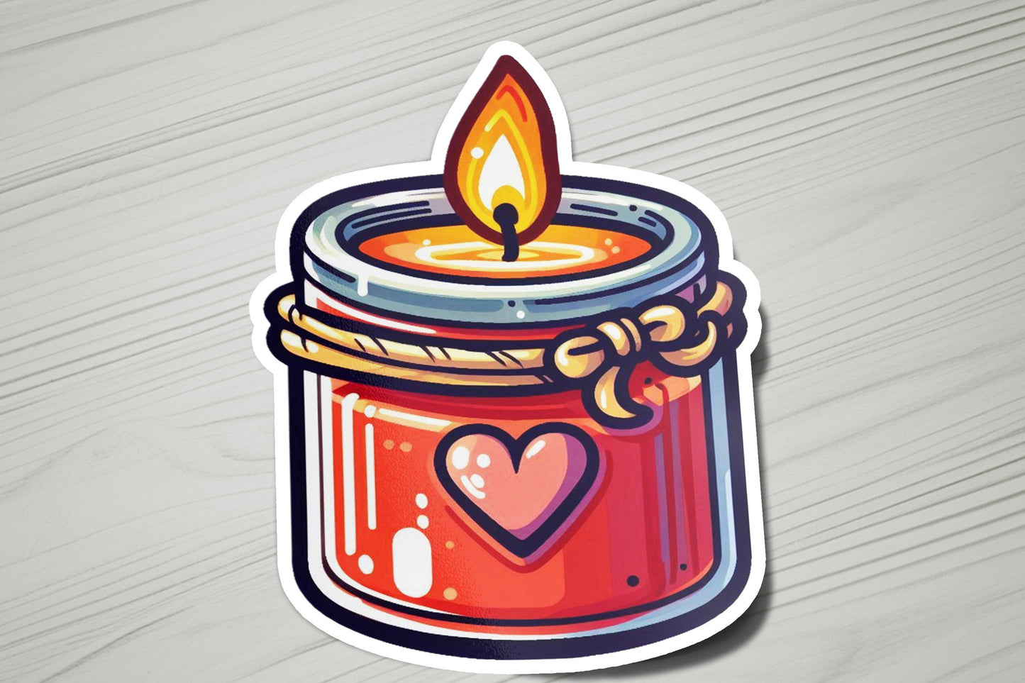 a sticker of a candle with a heart on it