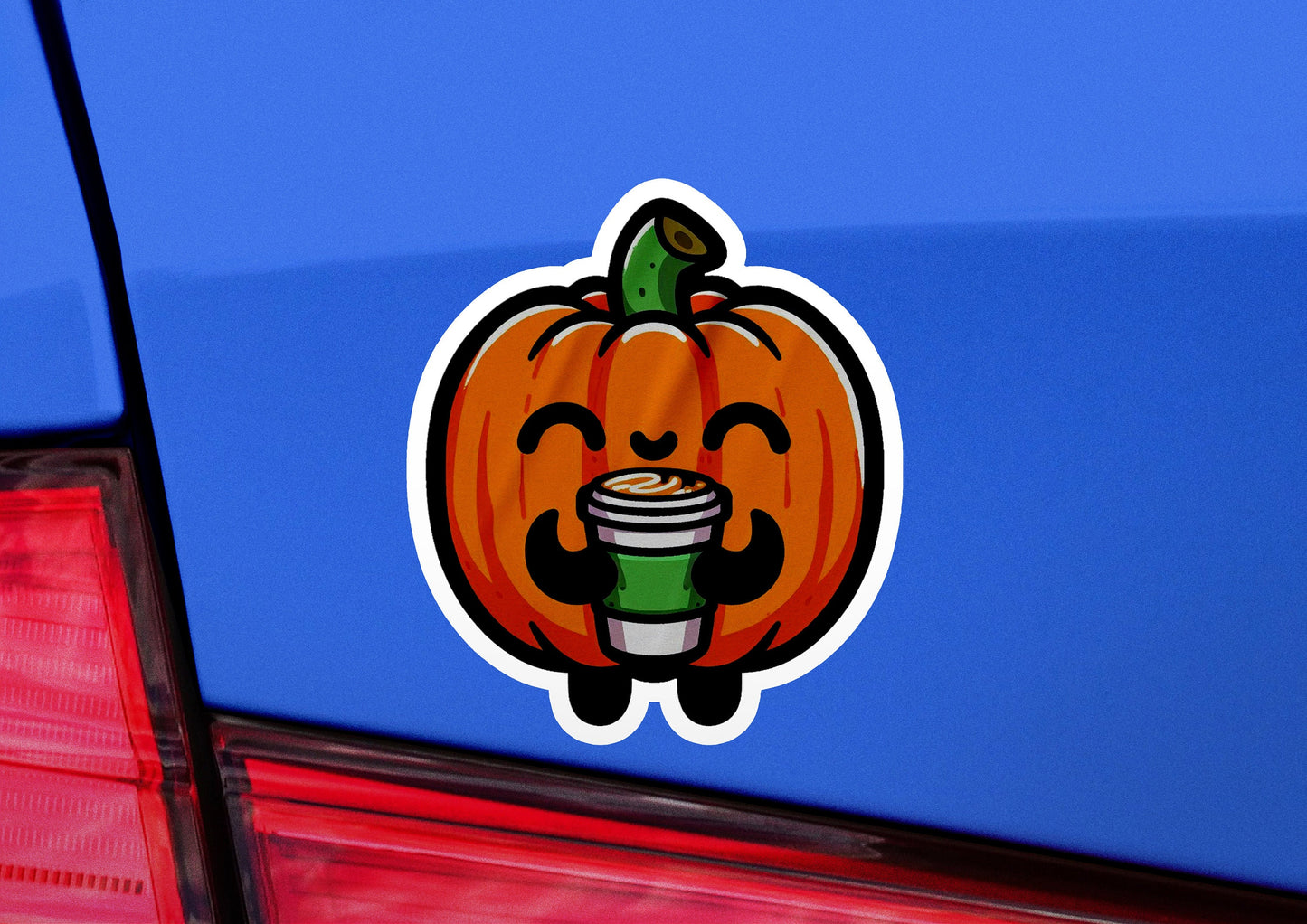 a sticker of a pumpkin holding a cup of coffee