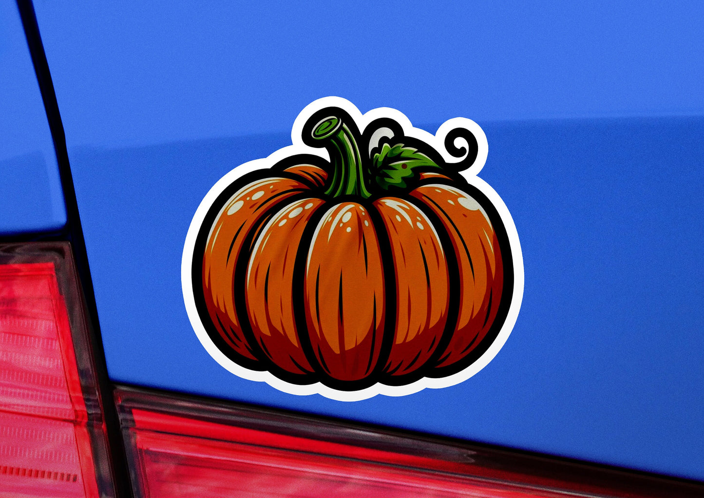 a sticker of a pumpkin on the back of a car