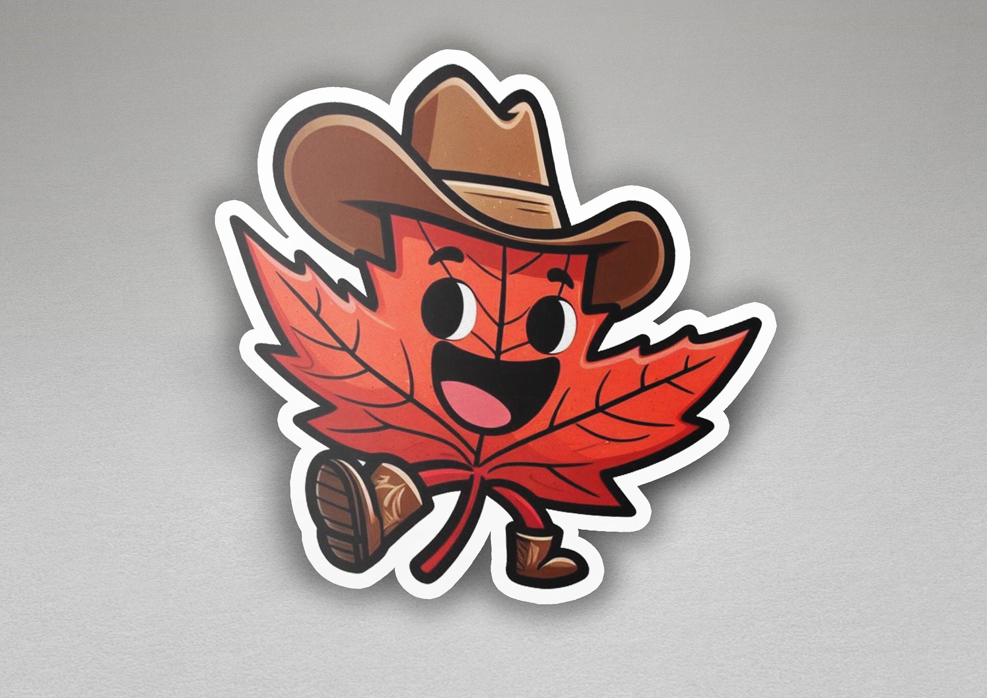 a sticker of a maple leaf wearing a cowboy hat