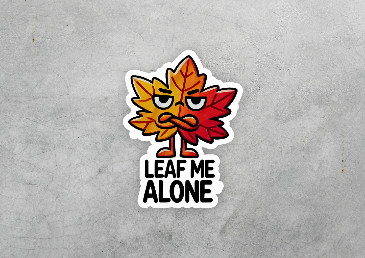 a leaf me alone sticker on a wall