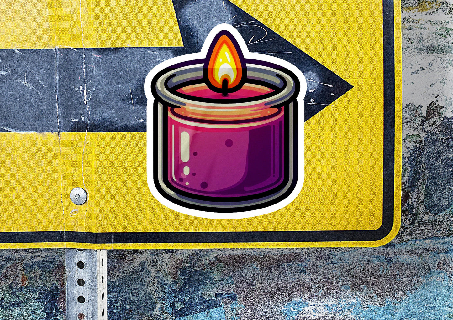 a close up of a street sign with a candle on it