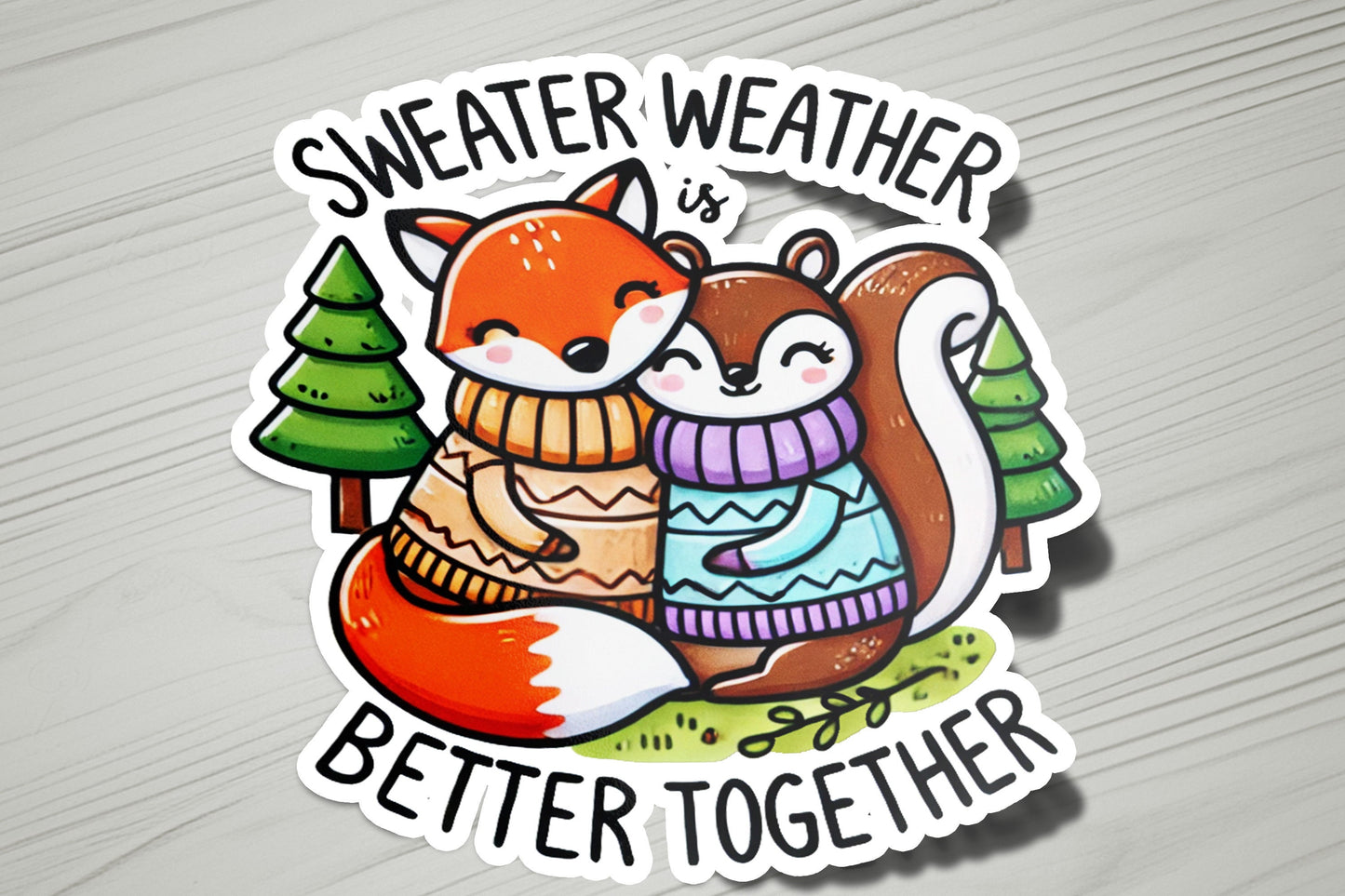 a sticker with an image of a fox and a squirrel hugging