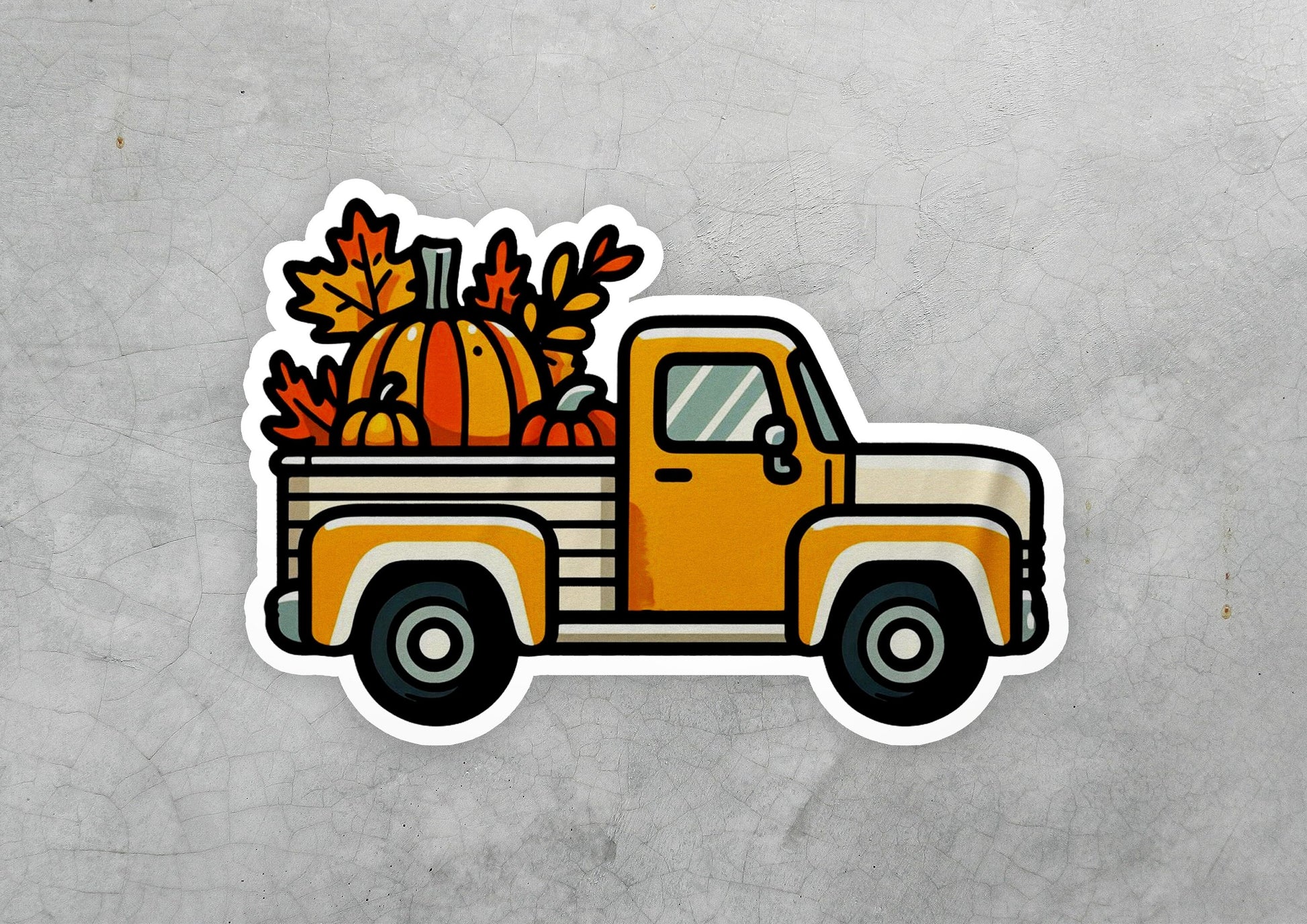 a sticker of a truck with pumpkins in the back