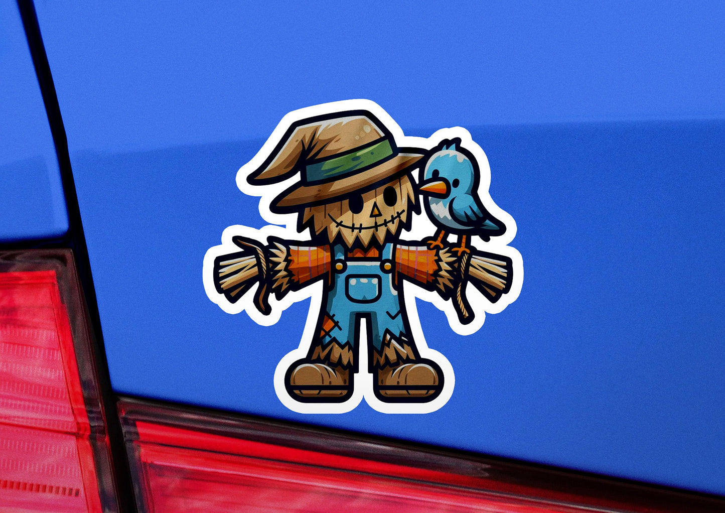 a sticker of a scarecrow holding a bird