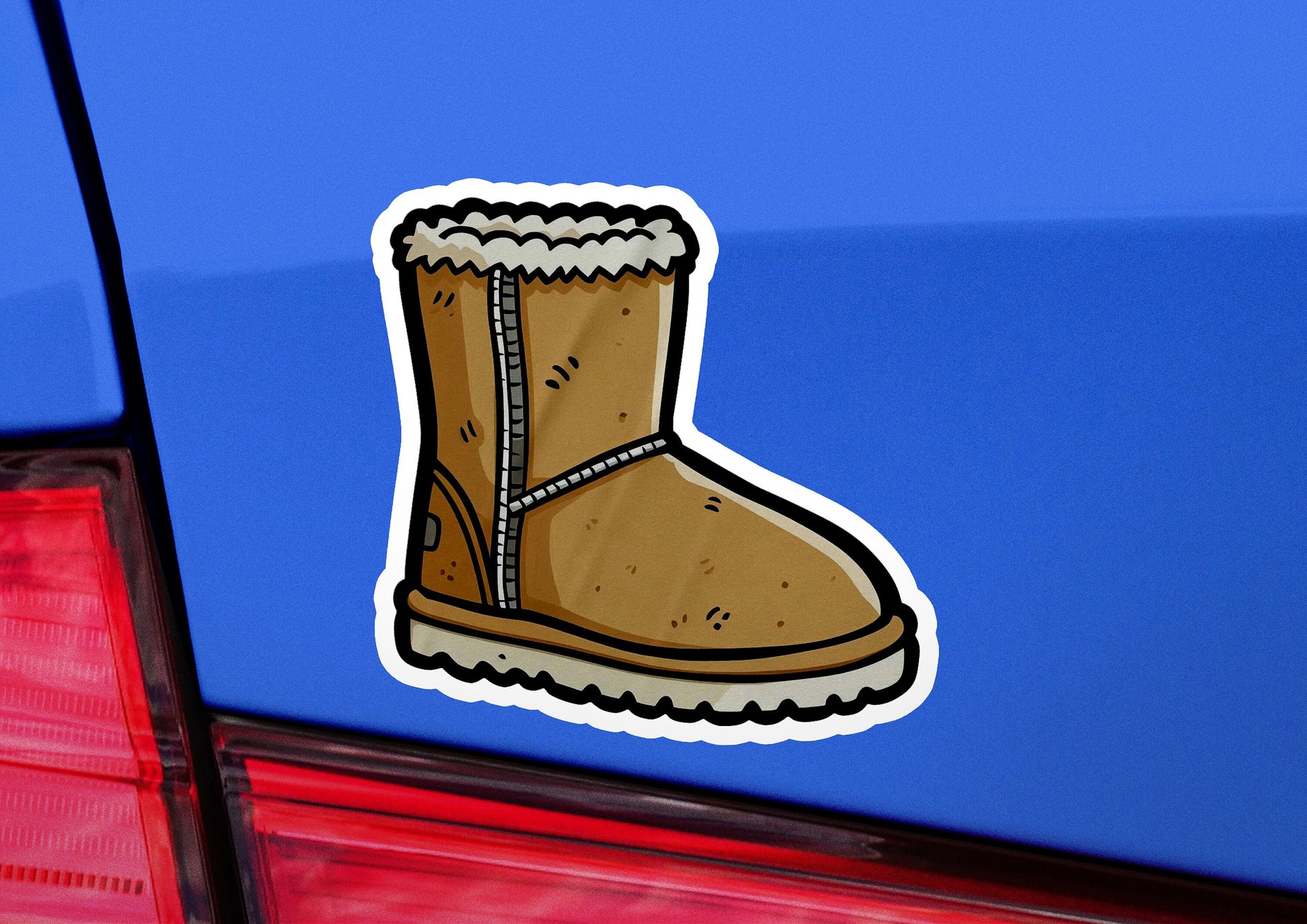 a sticker of a boot on the back of a car