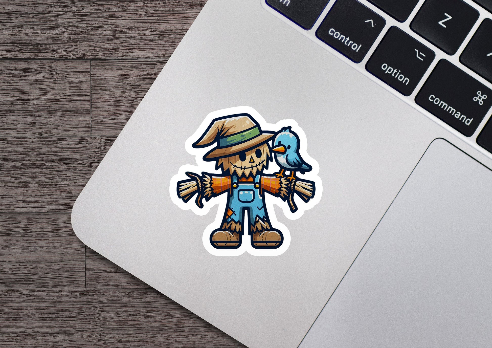 a sticker of a scarecrow with a bird on his shoulder