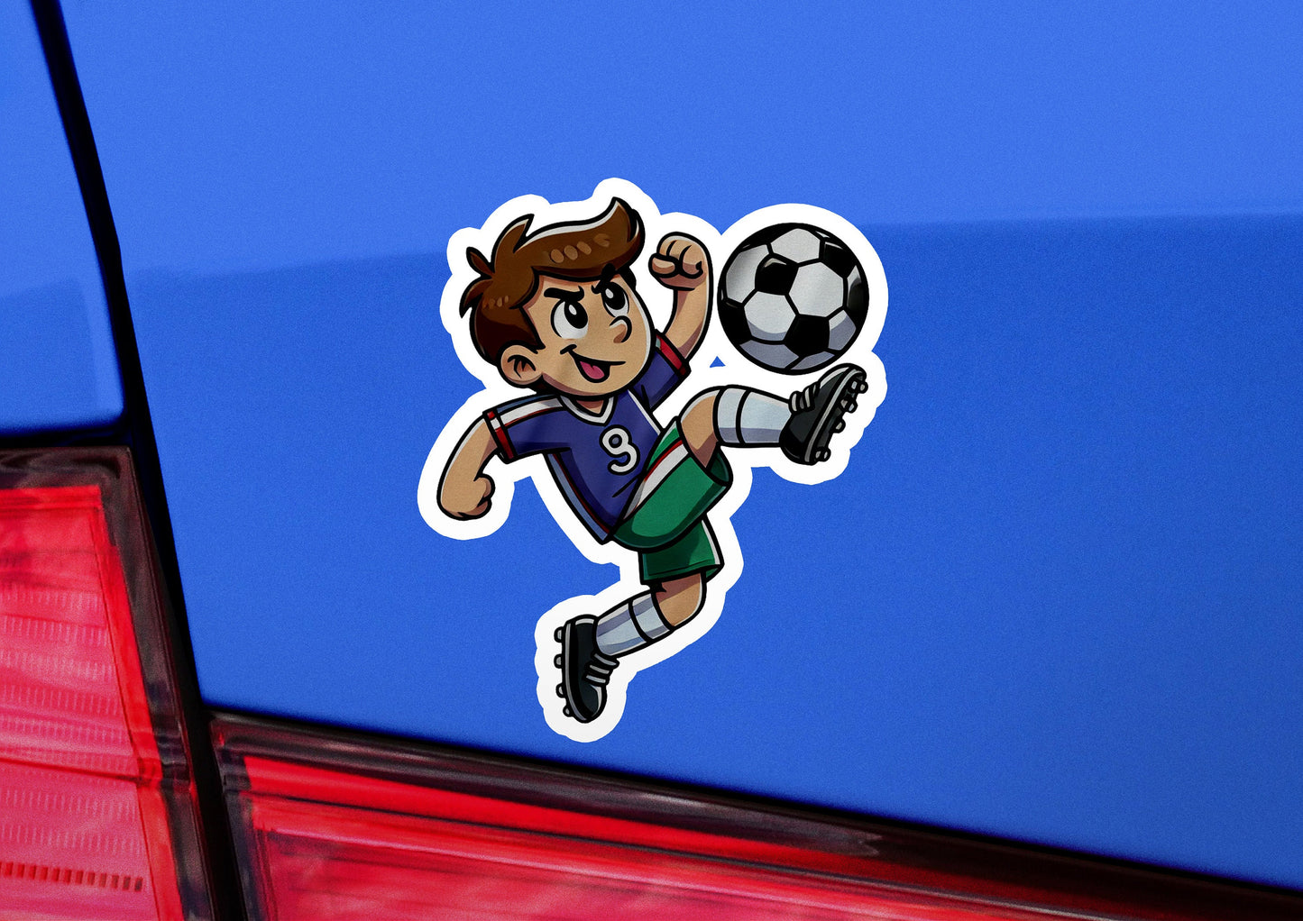 a sticker of a boy kicking a soccer ball