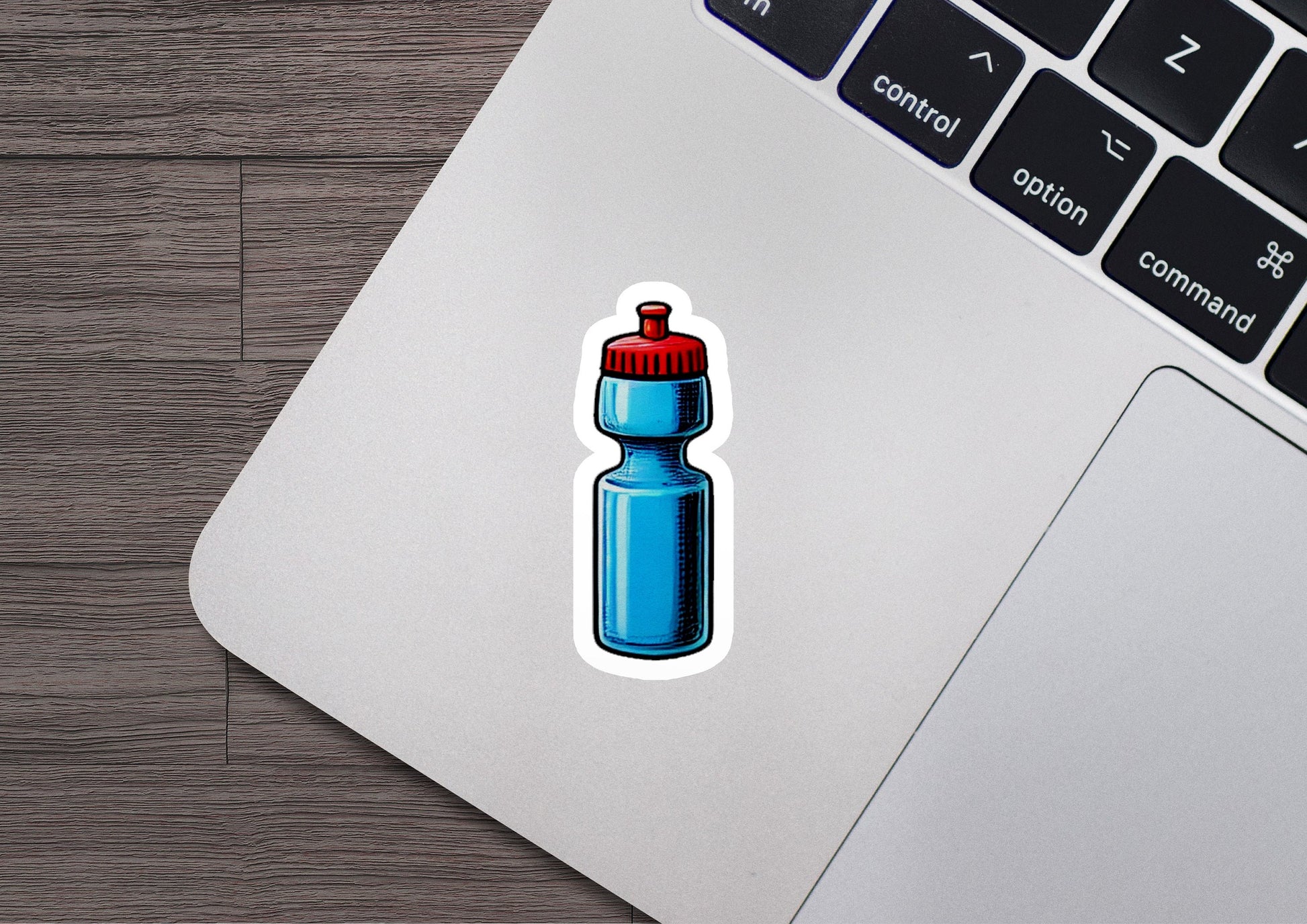 a laptop with a sticker of a water bottle on it