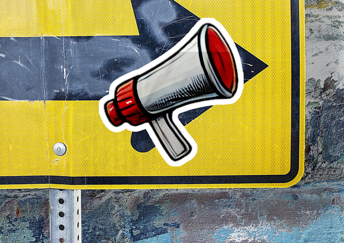 a yellow sign with a red and white megaphone sticker on it