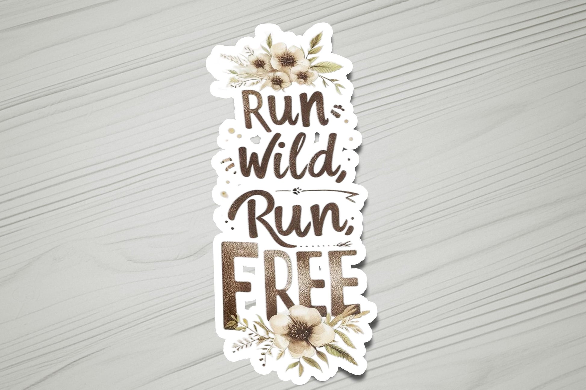 a sticker that says run wild, run free