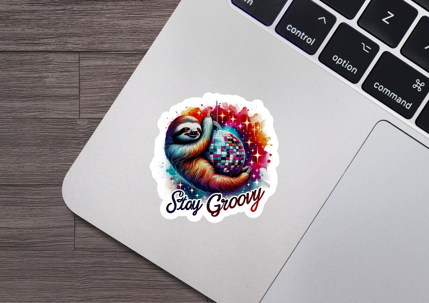 a sticker of a slotty grooy on a laptop