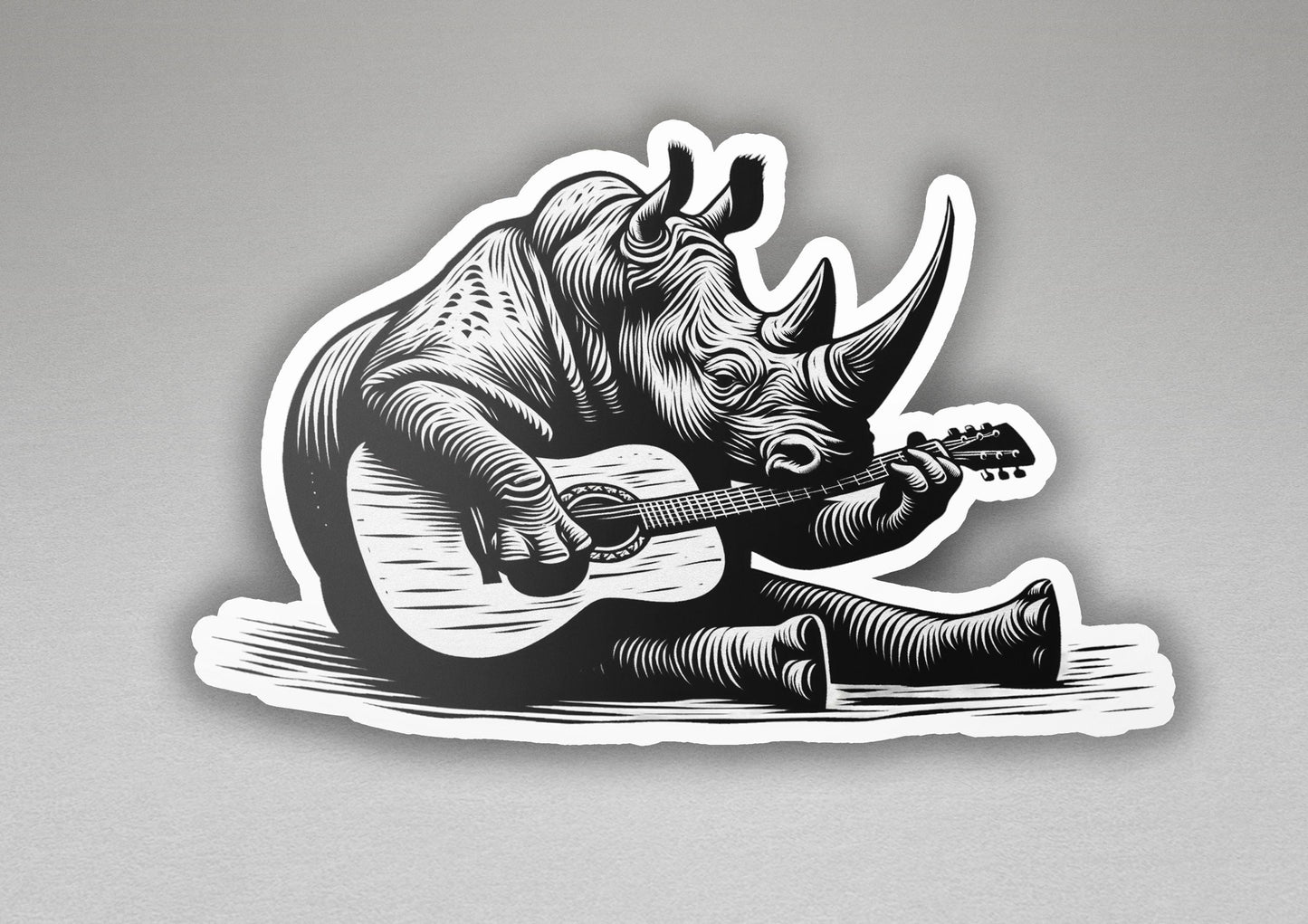 a sticker of a rhino playing a guitar