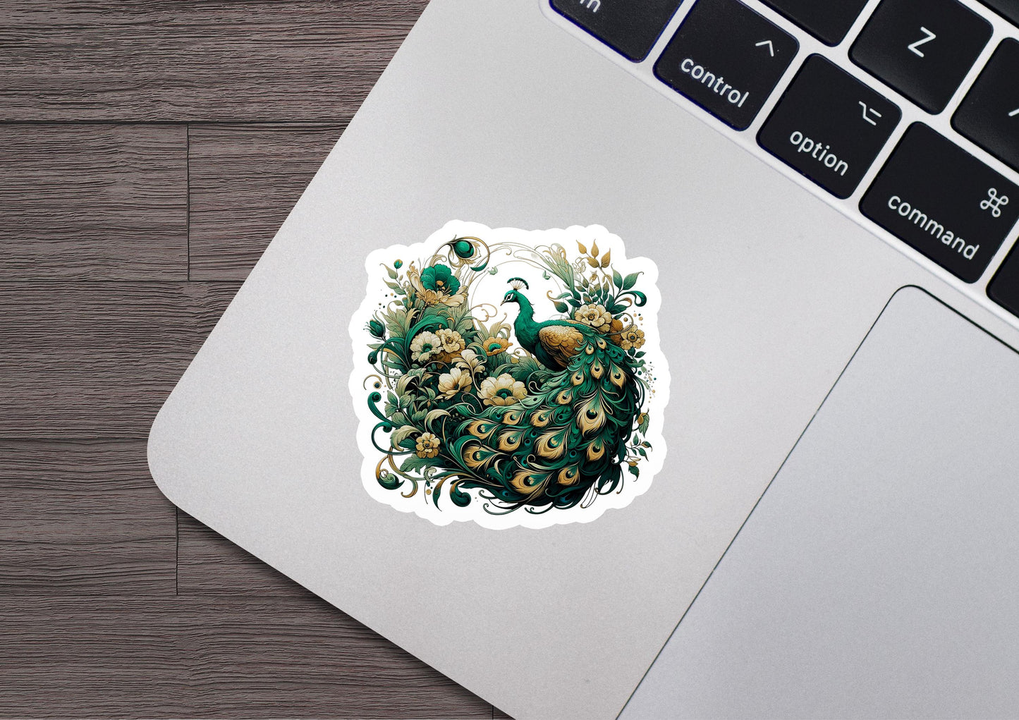 a laptop with a sticker of a peacock on it