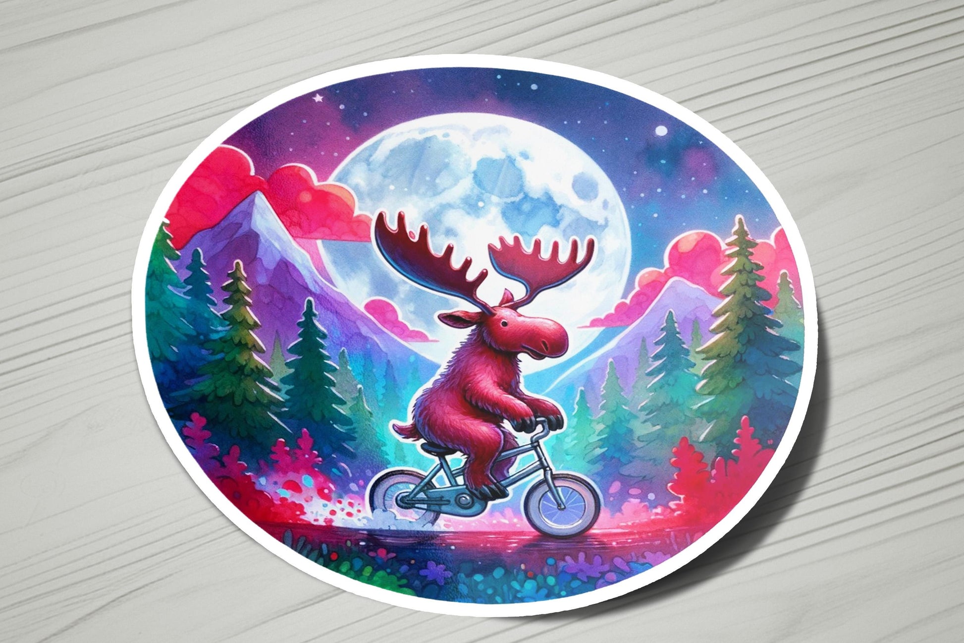 a sticker with a moose riding a bike