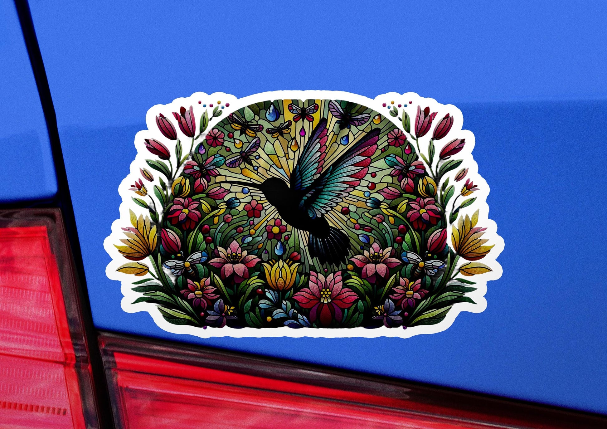 a car with a sticker of a bird on it