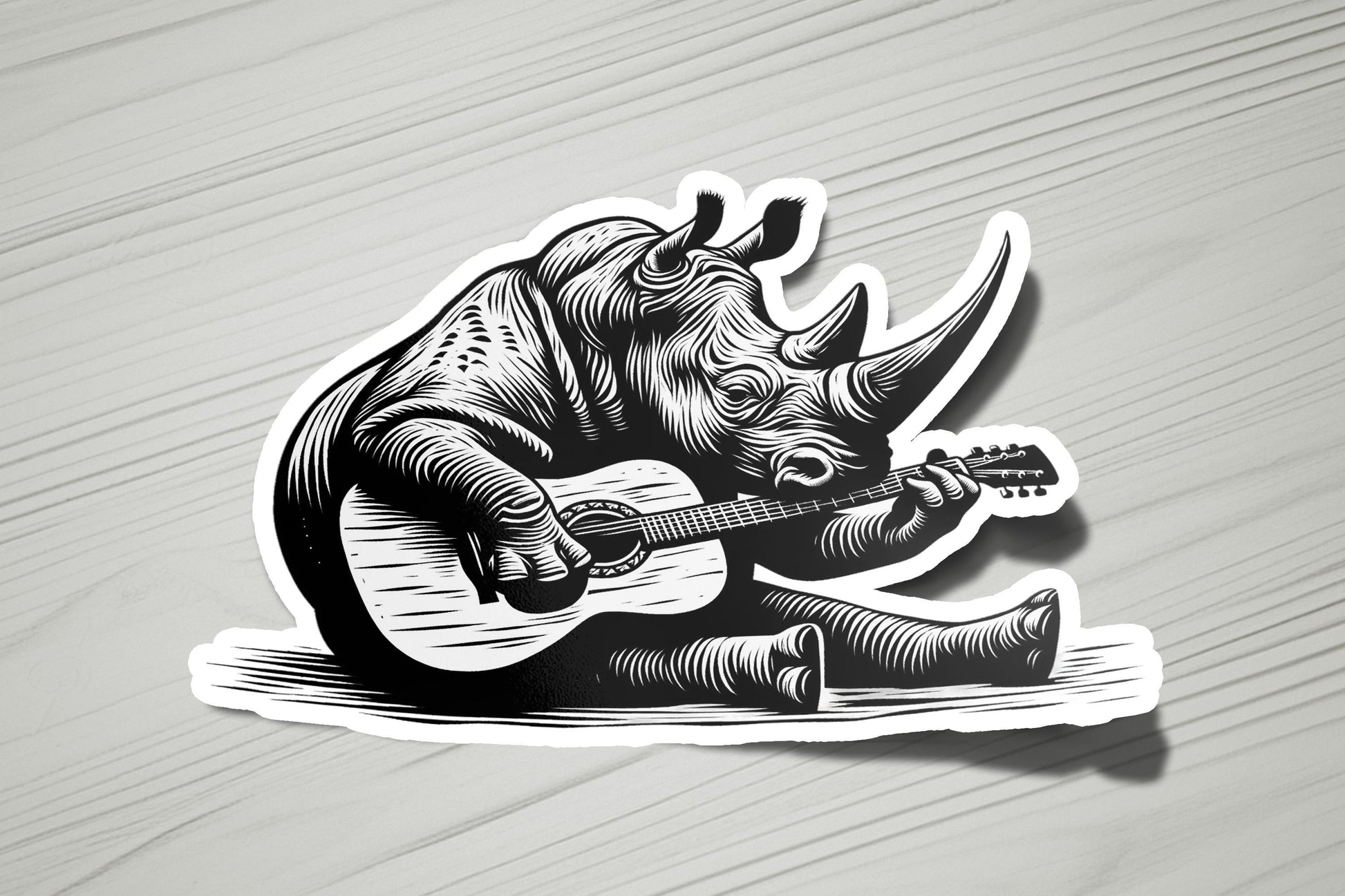 a sticker of a rhino playing a guitar