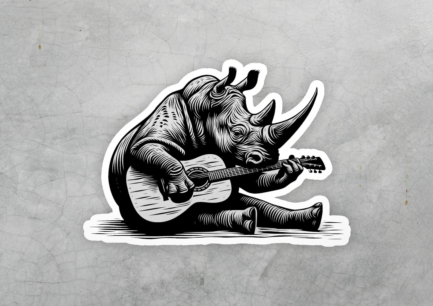 a sticker of a rhino playing a guitar