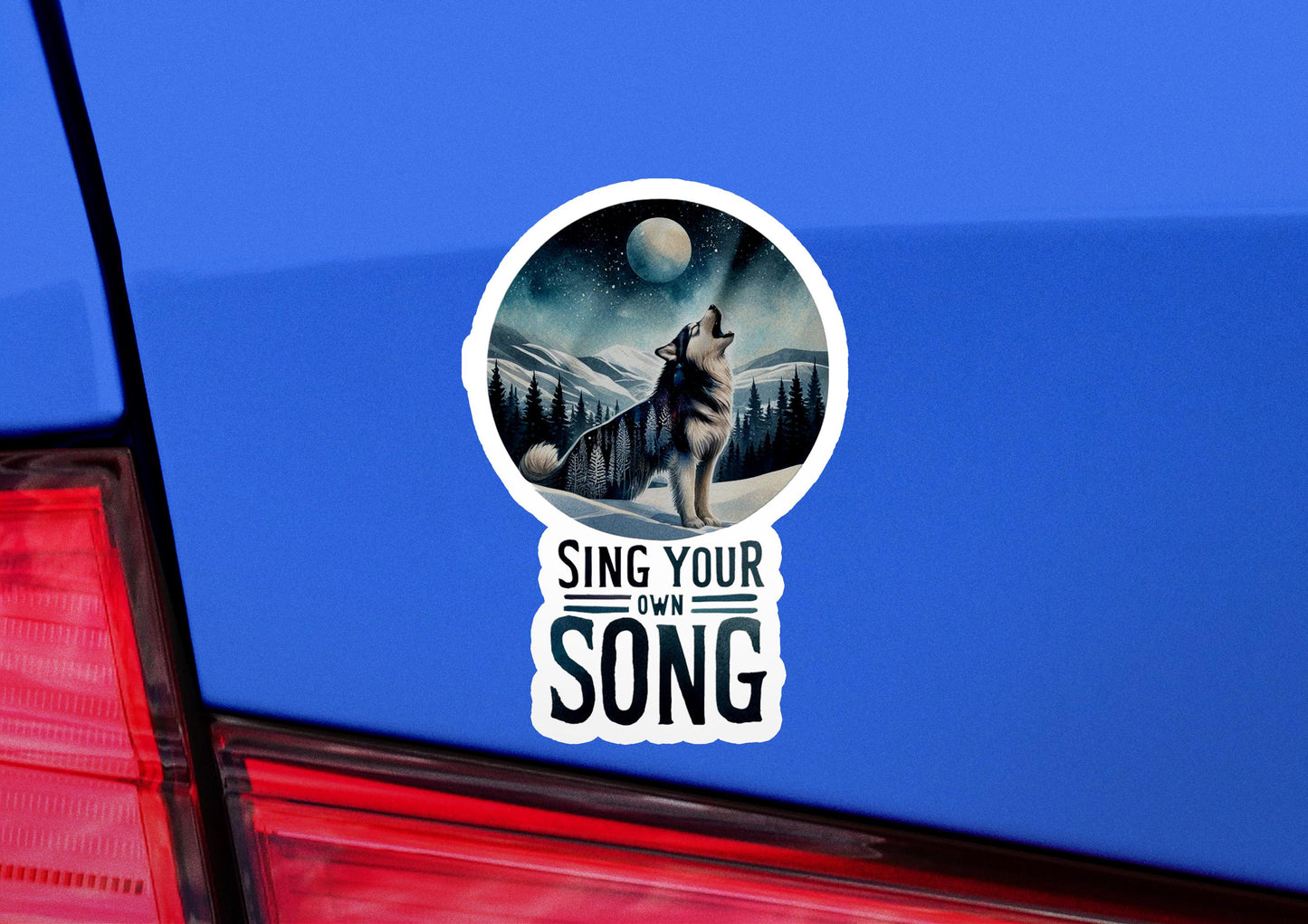 a sticker on the back of a car that says sing your song