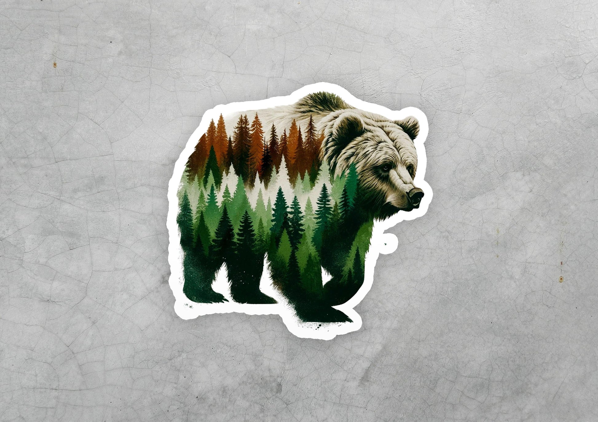 a sticker of a bear with trees on it