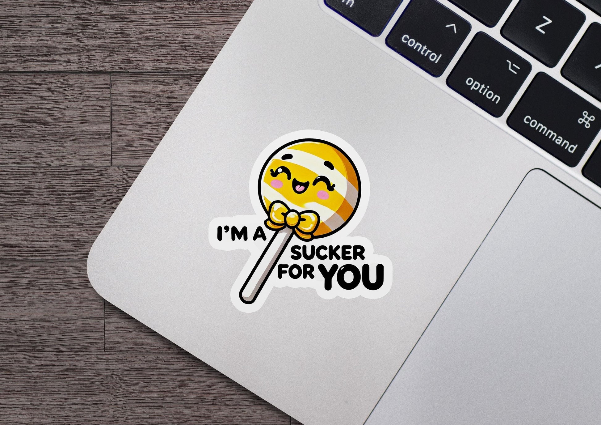 i'm a sucker for you sticker on a laptop