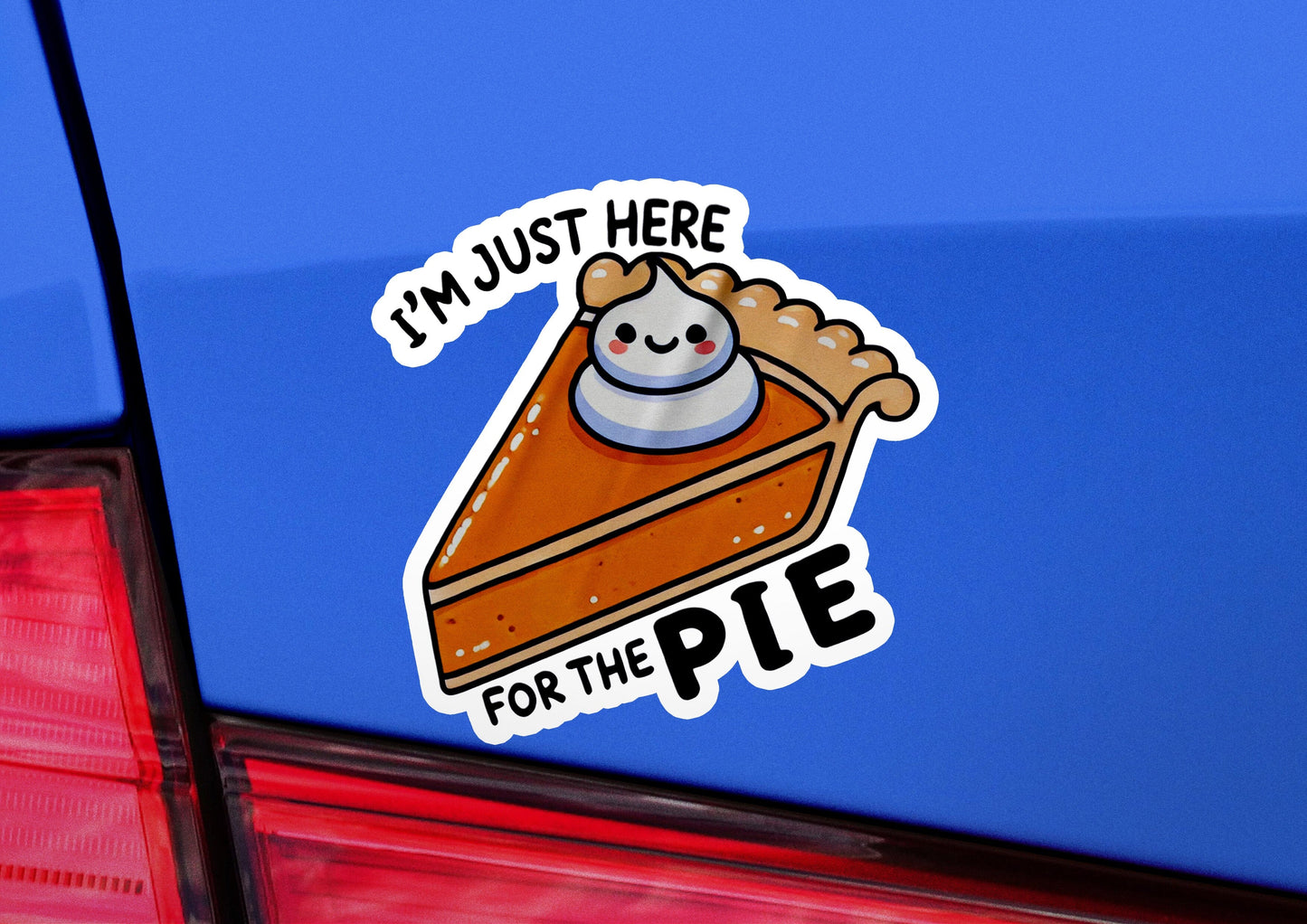 a sticker of a piece of pie on the back of a car
