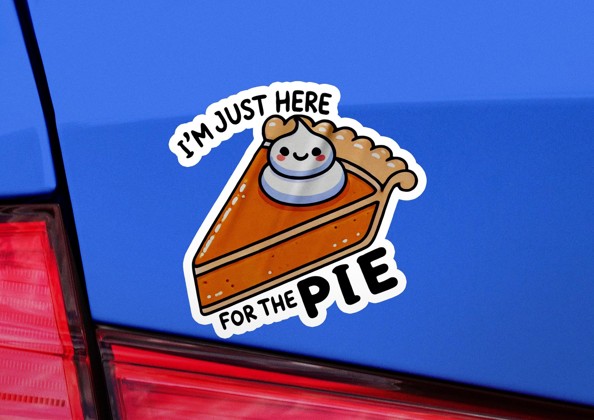 a sticker of a piece of pie on the back of a car