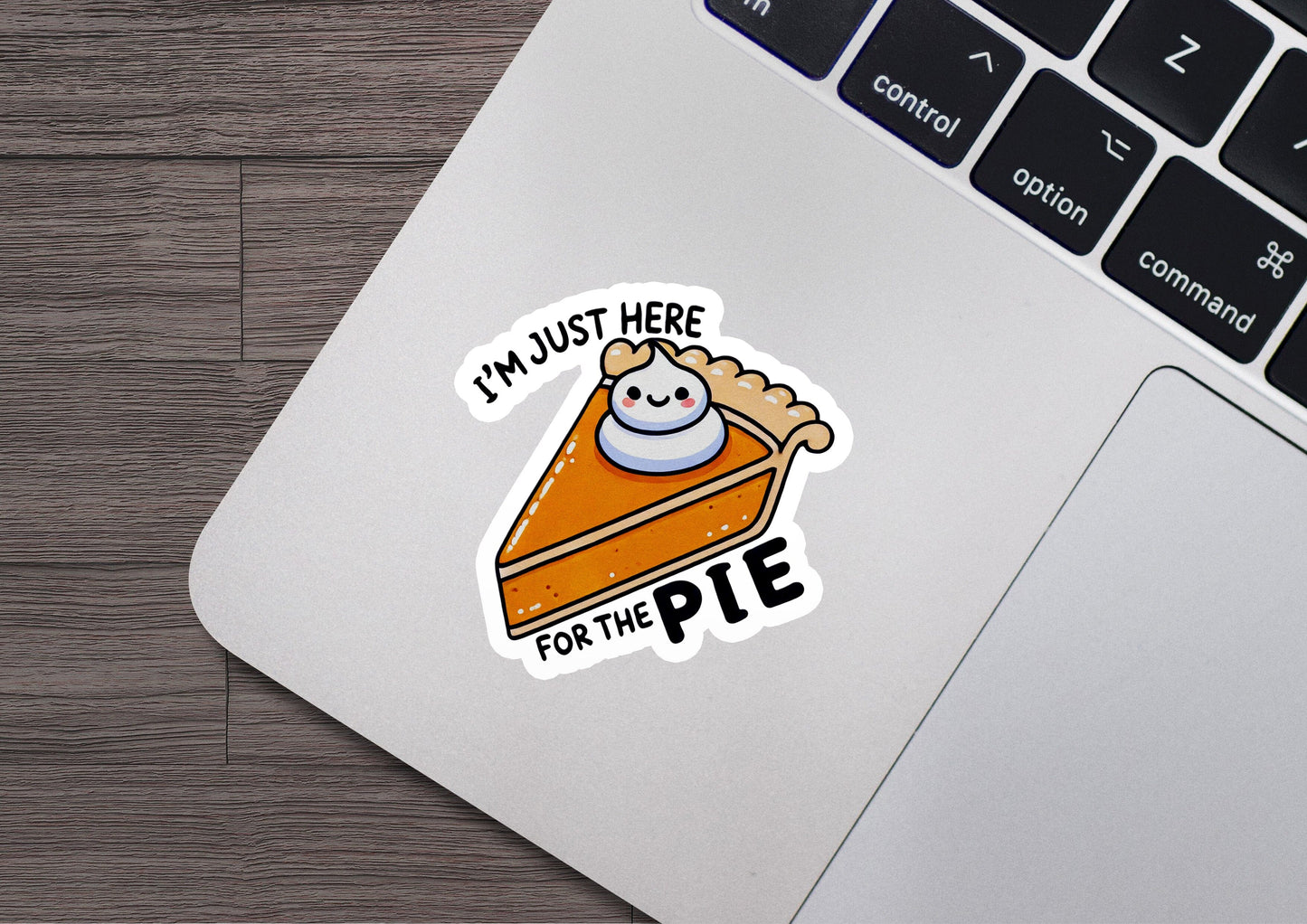 a sticker of a piece of pie on a laptop
